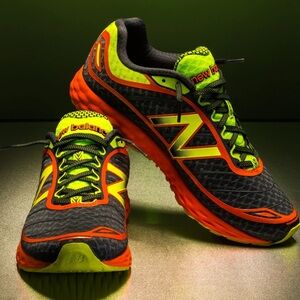 LIKE NEW New Balance Athletic Shoes - Dark Gray and Bright Orange
